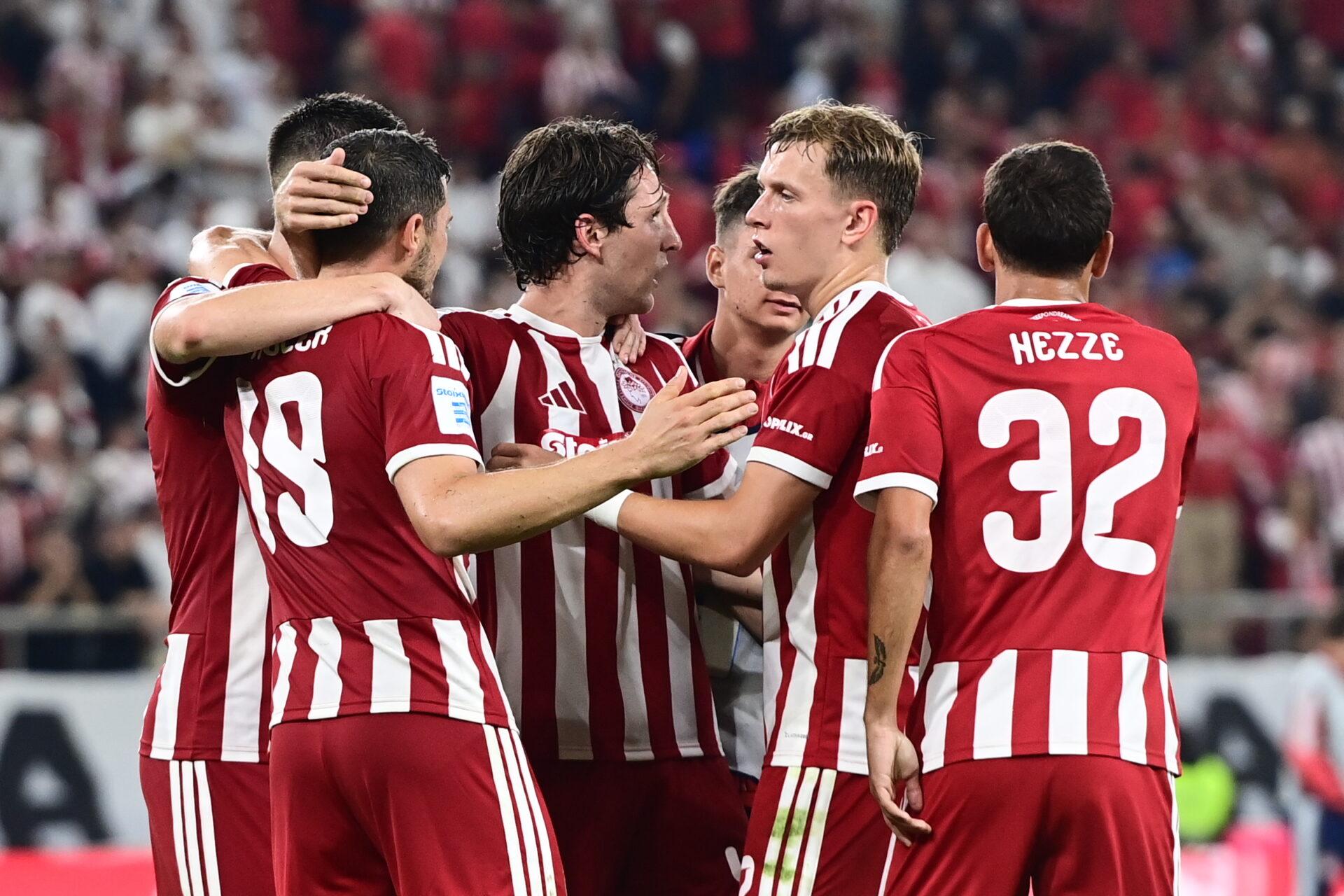 Santiago Hezze and teammates celebrating on the football pitch